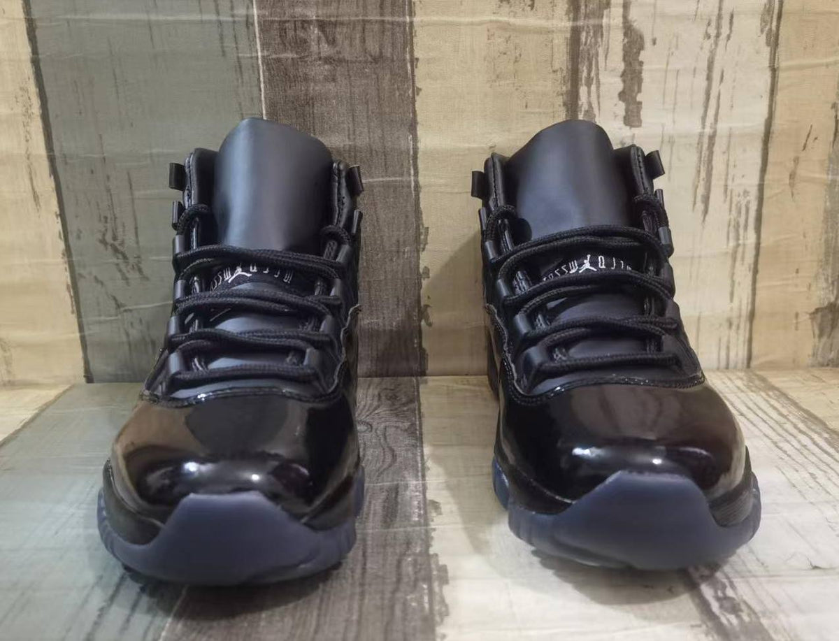 Air Jordan 11 Retro x Comme des Garçons Homme Plus Black