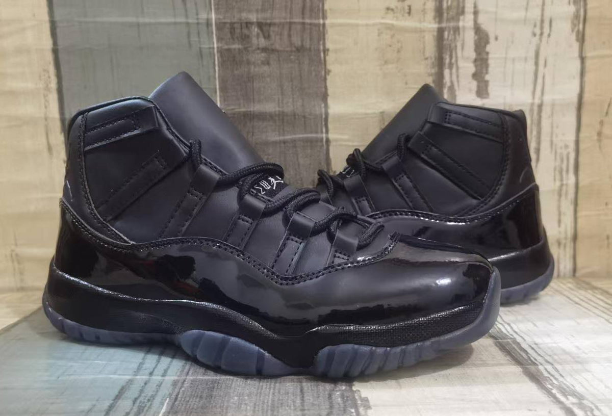 Air Jordan 11 Retro x Comme des Garçons Homme Plus Black
